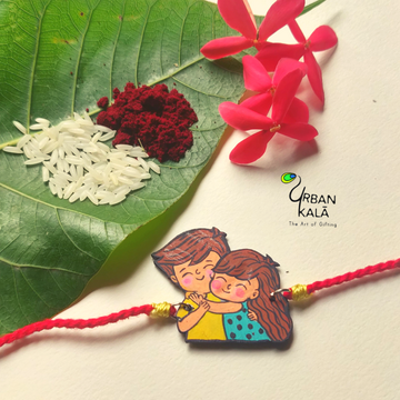 Bond Beyond Threads” – Handpainted Rakhi Magnet